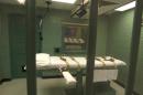 The death chamber is seen through the steel bars from the viewing room at the federal penitentiary in Huntsville, Texas