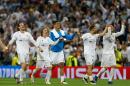 Real Madrid's Gareth Bale, left, and Cristiano Ronaldo, right, celebrate with their teammates at the end of the Champions League semifinal second leg soccer match between Real Madrid and Manchester City at the Santiago Bernabeu stadium in Madrid, Wednesday May 4, 2016. Real Madrid won 1-0. (AP Photo/Francisco Seco)