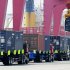 A shipping container is craned to a containership at a port in Qingdao in east China's Shandong province Wednesday, April 10, 2013. China reported higher import growth in March on Wednesday in a possible positive sign for its economic recovery but analysts said doubts about the accuracy of Beijing's data made it hard to draw conclusions. (AP Photo) CHINA OUT