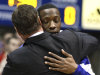 Kansas' Tyshawn Taylor, back, is hugged by head coach Bill Self as he is introduced before an NCAA college basketball game against Texas Saturday, March 3, 2012, in Lawrence, Kan. (AP Photo/Ed Zurga)