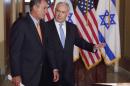 In this May 24, 2011 file photo, Israeli Prime Minister Benjamin Netanyahu walks with House Speaker John Boehner of Ohio to make a statement on Capitol Hill in Washington. Boehner has invited Netanyahu to address Congress about Iran. (AP Photo/Evan Vucci, File)