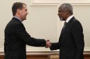 Russian President Dmitry Medvedev shake hands with U.N. and Arab League envoy to Syria Kofi Annan during their meeting in Moscow, Sunday, March 25, 2012. Russian President Dmitry Medvedev has told the U.N. and Arab League envoy to Syria that his mission 