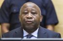 Former Ivory Coast President Laurent Gbagbo appears at a pre-trial hearing on charges of crimes against humanity at the International Criminal Court in The Hague, Netherlands, on February 19, 2013
