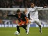 Real Madrid's Ronaldo fights for the ball with Valencia's Piatti during their King's Cup quarter-final first leg match at Santiago Bernabeu stadium in Madrid