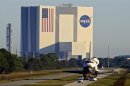 The space shuttle Atlantis leaves the Kennedy Space Center in Cape Canaveral