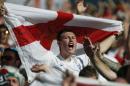 An England fan shouts during the group D World Cup soccer match between Costa Rica and England at the Mineirao Stadium in Belo Horizonte, Brazil, Tuesday, June 24, 2014. (AP Photo/Jon Super)