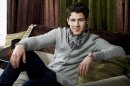 In this Feb. 22, 2012 photo, Nick Jonas poses for a portrait in his dressing room before a performance of Broadway's 