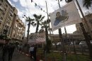 A banner depicting Mohammed Assaf, a contestant in Arab Idol, hangs from poles in the West Bank city of Ramallah