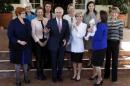 Australian Prime Minister Malcolm Turnbull poses for an official photograph with the female members of his cabinet after a swearing in ceremony at Government House in Canberra, Australia