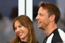 British Formula One driver Jenson Button and his wife Jessica, pictured here on June 6, 2015, were burgled while on holiday on the French Riviera
