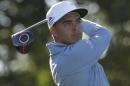 Rickie Fowler watches his tee shot on the 14th hole during the second round of the Honda Classic golf tournament, Friday, Feb. 26, 2016, in Palm Beach Gardens, Fla. (AP Photo/Lynne Sladky)