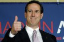 Republican presidential candidate, former Pennsylvania Sen. Rick Santorum gives a thumbs up during his election night party, Tuesday, March 13, 2012, in Lafayette, La. (AP Photo/Eric Gay)