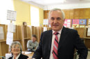 FILE - A Thursday June 12, 2008, photo from files showing former Taoiseach (Irish Prime Minister) Bertie Ahern casting his ballot in a polling centre in Dublin city centre. Former Irish Prime Minister Bertie Ahern received 209,779 euro ($276,000) in secret payments while in office and repeatedly told lies about this under oath, a mammoth fact-finding investigation ruled Thursday, March 22, 2012, in a long-awaited verdict. The three judges of the Mahon tribunal stopped short of finding Ahern guilty of corruption, because they found no evidence that Ahern gave favors to any of his donors of cash when he was finance minister in the 1990's. (AP Photo/ Peter Morrison, File)