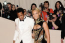 FILE -- In a may 2, 2011 file photo Beyonce Knowles and her husband Jay-Z arrive at the Metropolitan Museum of Art Costume Institute gala in New York. BeyoncÃ© and Jay-Z enjoyed a concert by R&B singer The-Dream Sunday March 11, 2012 in New York. (AP Photo/Evan Agostini)