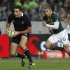Kahui of New Zealand's All Blacks is chased by Habana of South Africa's Springboks during their Tri-Nations rugby union match in Port Elizabeth