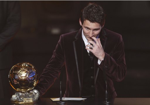 Messi of Argentina, FIFA World Player of the Year speaks next to his FIFA Ballon d'Or 2011 trophy during the FIFA Ballon d'Or 2011 soccer awards ceremony in Zurich