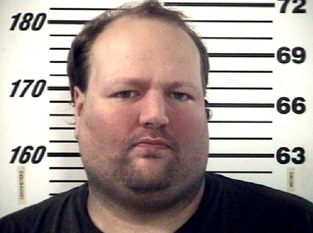 This December 2012 handout photo provided by the Effingham County Sheriff's Office shows Chad Moretz. A SWAT team sniper shot 34-year-old Moretz on Jan. 11, 2013, ending a four-hour standoff when Moretz emerged from his Effingham County home armed with an assault rifle. (AP Photo/Courtesy of the Effingham County Sheriff's Office)