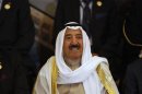 Kuwait's Emir Al-Sabah smiles during the opening session of the 23rd Arab League summit in Baghdad