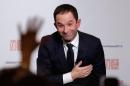 Former French education minister Benoit Hamon reacts after partial results in the second round of the French left's presidential primary election in Paris