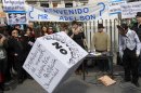 People gathered in a protest against the Eurovegas project in Madrid, Spain, Saturday, March 17, 2012. Poster reads 
