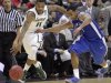 Michigan State's Keith Appling, left, brings the ball up as Saint Louis' Kwamain Mitchell fouls him to stop the clock during the second half of an NCAA men's college basketball tournament third-round game Sunday, March 18, 2012, in Columbus, Ohio. Michigan State won 65-61. (AP Photo/Jay LaPrete)