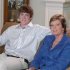 In a Monday, Aug. 22, 2011, photo provided by the University of Tennessee, Tennessee women's basketball coach Pat Summitt sits next to her son, Tyler Summitt, at her Knoxville, Tenn., home. Summitt plans to coach "as long as the good Lord is willing" despite recently being diagnosed with early onset dementia. In a statement from Summitt released by the university on Tuesday, the Hall of Fame coach said she visited with doctors at the Mayo Clinic in Rochester, Minn., after the end of the 2010-11 basketball season ended and was diagnosed with early onset dementia--Alzheimer's type--over the summer. (AP Photo/University of Tennessee, Debby Jennings)