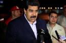 Venezuela's President Nicolas Maduro talks to the media after arriving at Jose Marti international airport in Havana