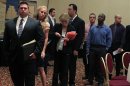People wait in line to meet with recruiters during a job fair in Melville, New York