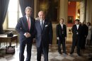 US Secretary of State John Kerry (L) greets French Foreign Minister Laurent Fabius in Paris, September 7, 2013