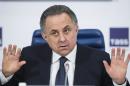 FILE - In this Friday, Dec. 25, 2015 file photo, Russian Sports Minister Vitaly Mutko gestures during a news conference in Moscow, Russia. Russian sports minister Vitaly Mutko, who has come under scrutiny in Russia's doping scandal, has been promoted to a deputy prime minister, on Wednesday Oct. 19, 2016. State news agency Tass says President Vladimir Putin approved a proposal by Prime Minister Dmitry Medvedev to appoint Mutko to a deputy premiership in charge of sport, tourism and youth policies. (AP Photo/Pavel Golovkin, File)