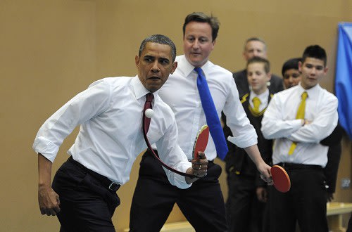 US President Barack Obama and Prime Minister David Cameron play table tennis at Globe Academy in south London