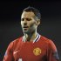 Manchester United's Ryan Giggs walks to the corner flag during their English Premier League soccer match against Fulham at Craven Cottage in London