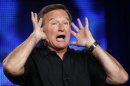 Robin Williams gestures during a panel discussion for his upcoming HBO show "Robin Williams: Weapons of Self-Destruction" at the Television Critics Association Cable summer press tour in Pasadena