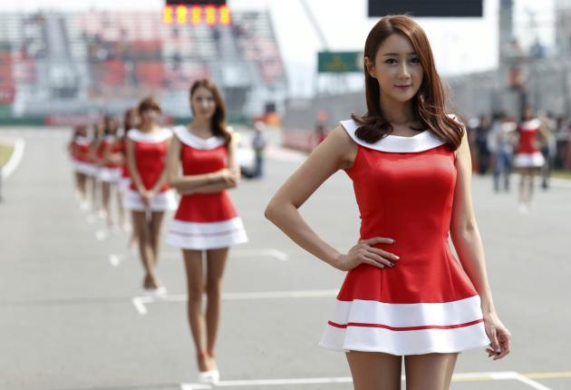 Formula One Grid Girls Stand Before The Third Practice Session Of The 