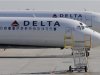 Delta Airlines MD-88 (foreground) with Airbus A320 (background) at Hartsfield-Jackson International Airport in Atlanta.