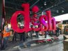 Workers build a booth for Dish, a satellite TV provider, as they prepare for the International CES show at the Las Vegas Convention Center in Las Vegas