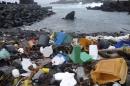 A handout picture shows a beach in the Azores is pictured littered with plastic garbage