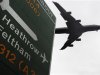 An aircraft comes into land at Heathrow Airport in London