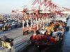 This photo taken Wednesday, Jan. 4, 2012 shows a container port in Qingdao in east China's Shandong province. China's trade suffered its biggest decline since the 2008 crisis in January, a new sign of weak global demand and a slowing domestic economy. Exports fell 0.5 percent from a year earlier to $149.9 billion, while imports were down 15 percent at $122.7 billion, customs data showed Friday, Feb. 10, 2012. (AP Photo) CHINA OUT