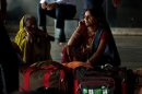 Women stranded at a railway station thanks to the power outage