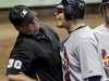 St. Louis Cardinals' Yadier Molina argues with home plate umpire Rob Drake after being called out on strikes during the 10th inning of a baseball game against the Milwaukee Brewers Tuesday, Aug. 2, 2011, in Milwaukee. (AP Photo/Morry Gash)