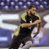 FOR USE AS DESIRED WITH NFL DRAFT STORIES - FILE - In this Feb. 25, 2012, file photo, Ohio State offensive lineman Mike Adams runs a drill at the NFL football scouting combine in Indianapolis. Adams is a top prospect in the upcoming NFL football draft. (AP Photo/Michael Conroy, File)