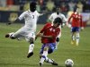 Ghana's Richard Mpong fights for the ball with Chile's Lucas Dominguez during their international friendly soccer match in Chester, Pennsylvania