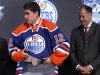 Yakupov puts on his new jersey after being picked by Oilers in the first round of the NHL draft in Pittsburgh