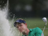 Luke Donald of England, hits from the sand on the 15th hole during the first round of the Tour Championship golf tournament at East Lake Golf Club in Atlanta on Thursday, Sept. 22, 2011. (AP Photo/Dave Martin)