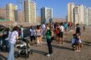 People wait in high areas after hearing a tsunami alert following a quake in Iquique, 1800 km north of Santiago, Chile, on March 16, 2014