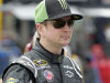 FILE - Kurt Busch walks through the garage before practice for Saturday's NASCAR Sprint Cup Series All Star auto race in Concord, N.C., in this May 18, 2012 file photo. NASCAR's mercurial former champion had another of his all-too-familiar meltdowns, this time when asked a relatively benign question by a respected motorsports reporter who's been around the garage for years resulting in a one race suspension. (AP Photo/Terry Renna, File)