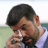 Boston Red Sox catcher Jason Varitek wipes a tear during his baseball retirement announcement in Fort Myers, Fla., Thursday, March 1, 2012. Varitek says he grappled with the decision for a long time. The Red Sox offered the 39-year-old a chance to come to camp on a minor-league contract, but he declined. He says "the hardest thing to do is walk away from your teammates." (AP Photo/Alan Diaz)