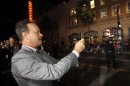 Hanks photographs fans at the premiere of "Cloud Atlas" at the Grauman's Chinese theatre in Hollywood