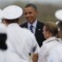 President Barack Obama is greeted at the airport as he arrives to Cartagena, Colombia, Friday April 13, 2012. Obama is in Cartagena to attend the sixth Summit of the Americas.  (AP Photo/Carolyn Kaster)